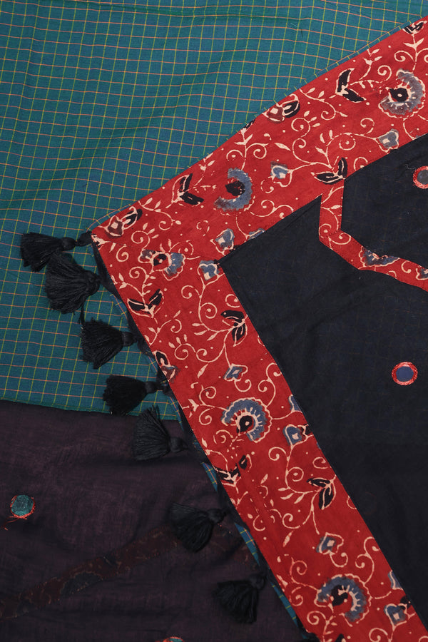 H.O.T curated - Black Mul cotton with Ajrakh and green chettinad checks border - The lotus pallu