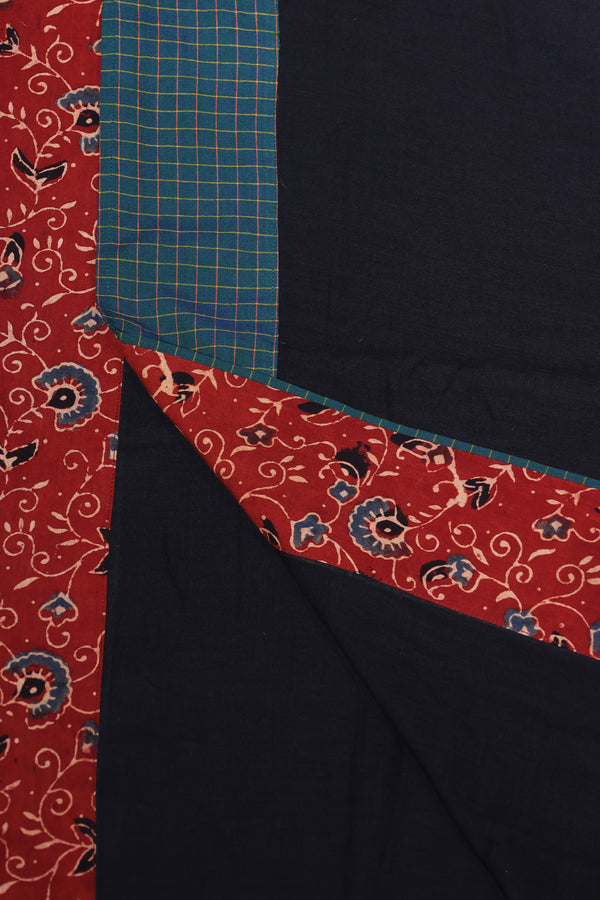 H.O.T curated - Black Mul cotton with Ajrakh and green chettinad checks border - The lotus pallu
