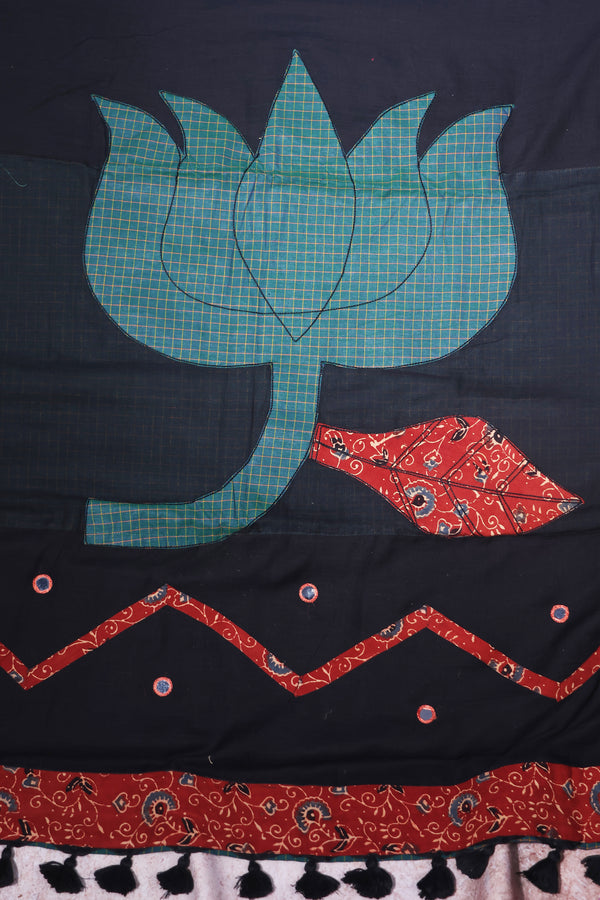 H.O.T curated - Black Mul cotton with Ajrakh and green chettinad checks border - The lotus pallu