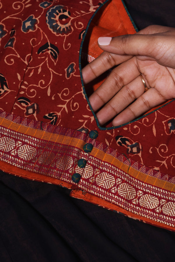 H.O.T curated - Black Mul cotton with Ajrakh and green chettinad checks border - The lotus pallu