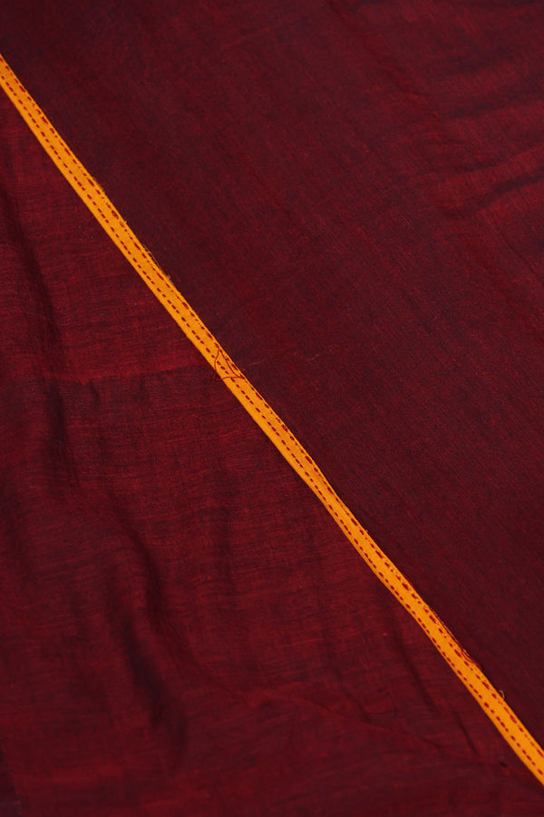 H.O.T curated - The maroon mull cotton with chettinad cotton pallu and Kantha border .