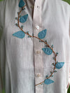 Blush pinstriped cotton shirt with leaf applique