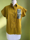Mustard striped cotton shirt with hand-embroidered faux pocket