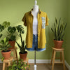 Mustard striped cotton shirt with hand-embroidered faux pocket